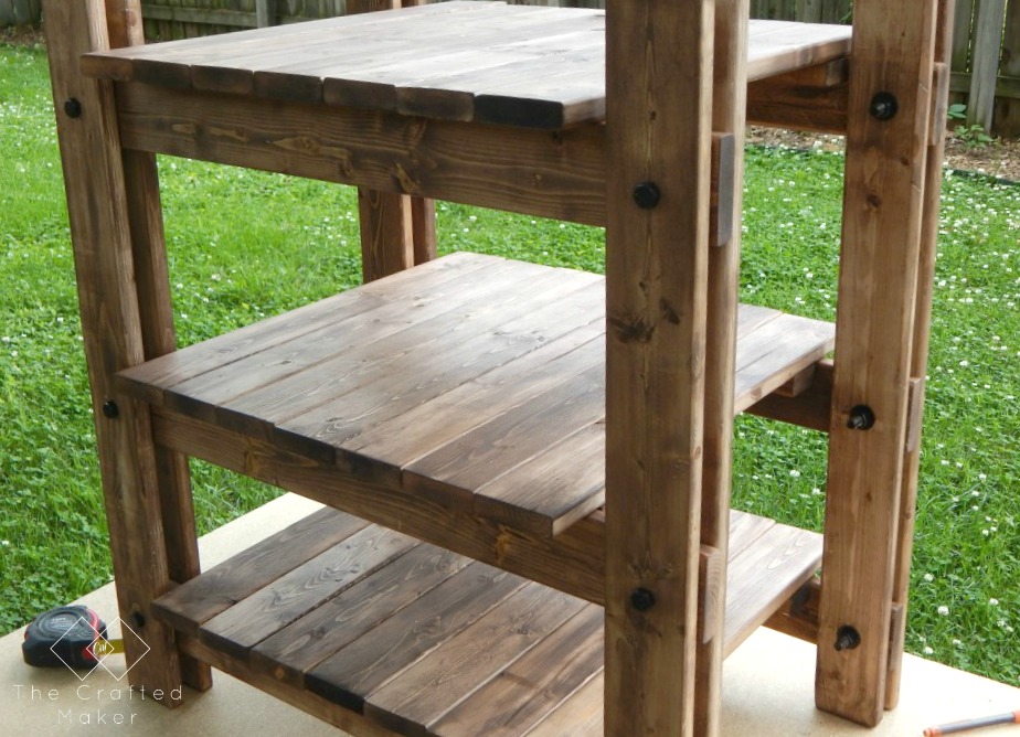 Build this DIY Arhaus inspired end table! Easy build with just a few sizes of wood and nuts and bolts. Great weekend project. Includes free PDF plans!