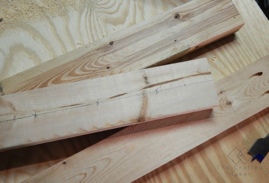 Build this DIY hanging wine rack out of one 2X4 board. For less than a bottle of wine, you can display your wine selection in style.
