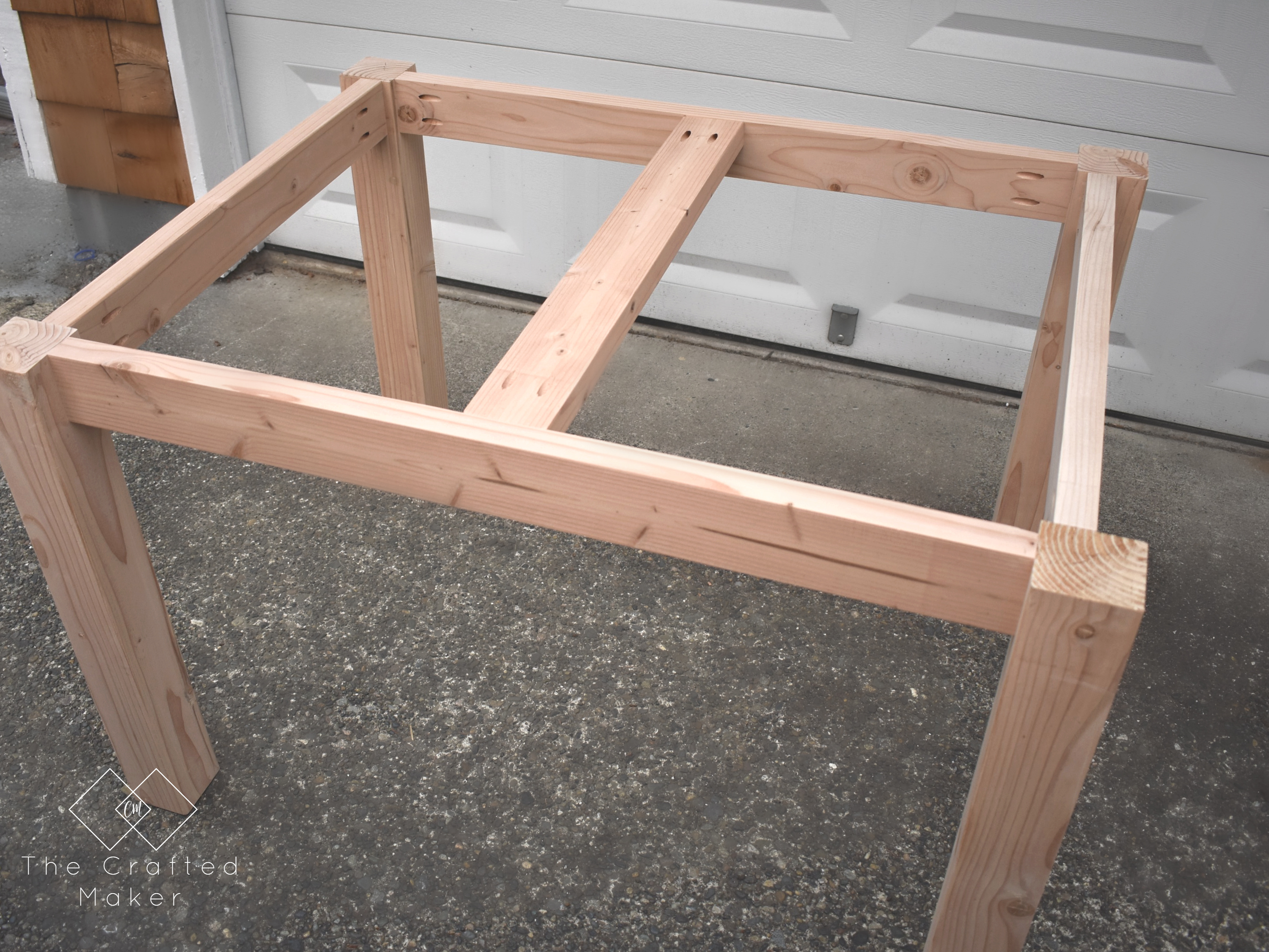 Build this modern farmhouse dining table for your next gathering. This table is perfect for smaller dining rooms or breakfast nooks.