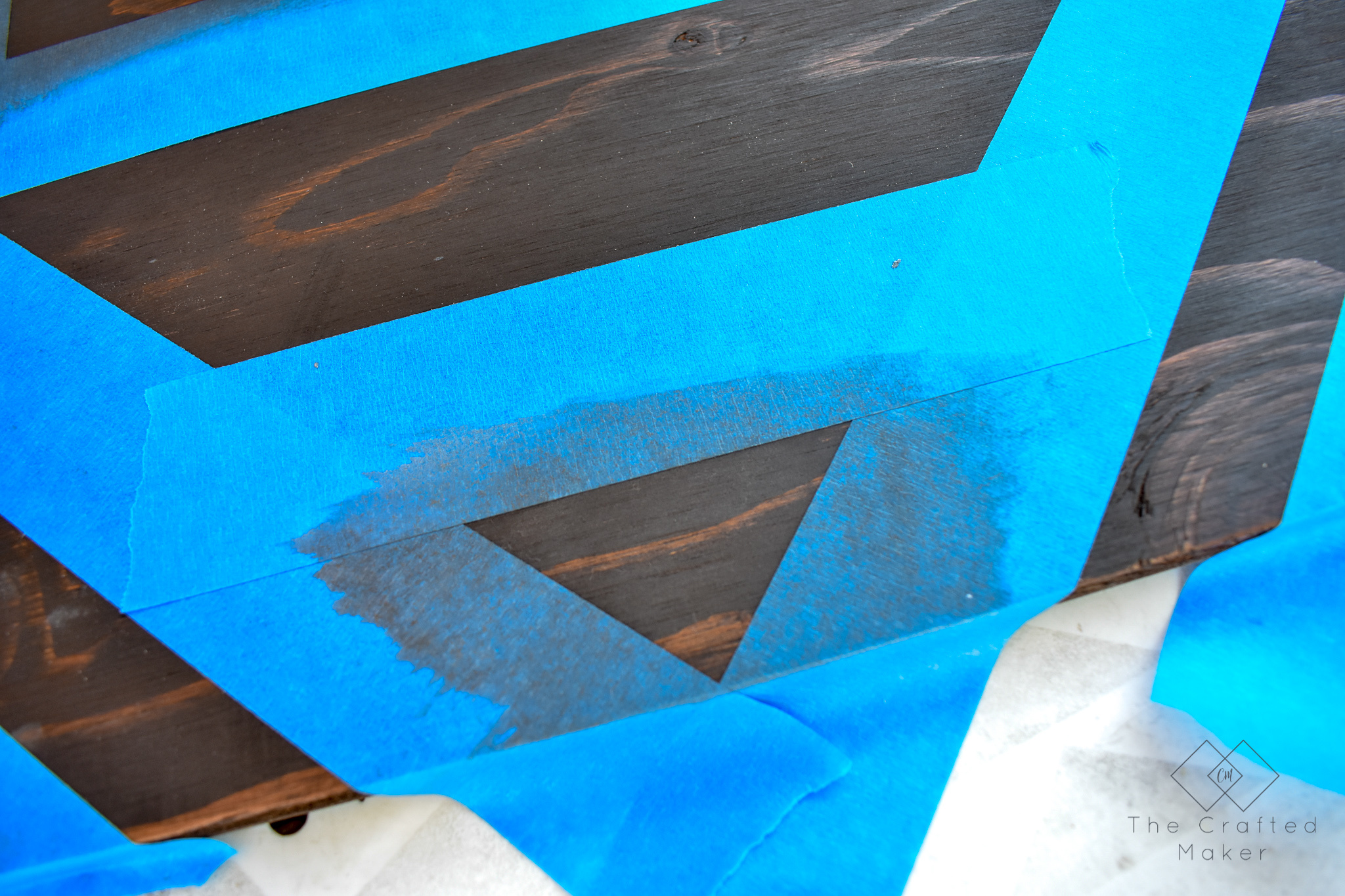 Make this fun geometric scrap wood wall art with scrap wood and paint you already have on hand. This is a quick, colorful, and creative afternoon project!