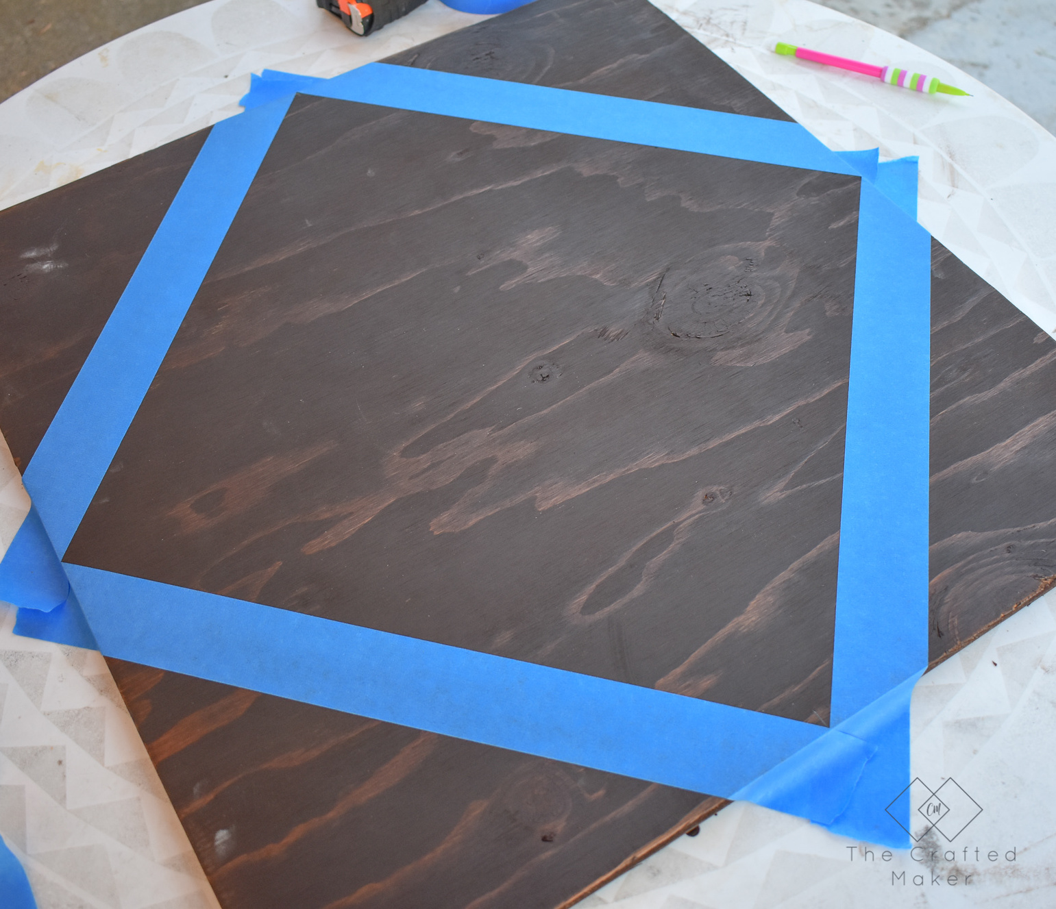 Make this fun geometric scrap wood wall art with scrap wood and paint you already have on hand. This is a quick, colorful, and creative afternoon project!