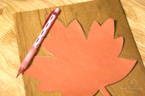 Fall is finally here and it's time to decorate accordingly. Make this quick, easy, and adorable Fall leaf door hanger with scrap wood you already have!